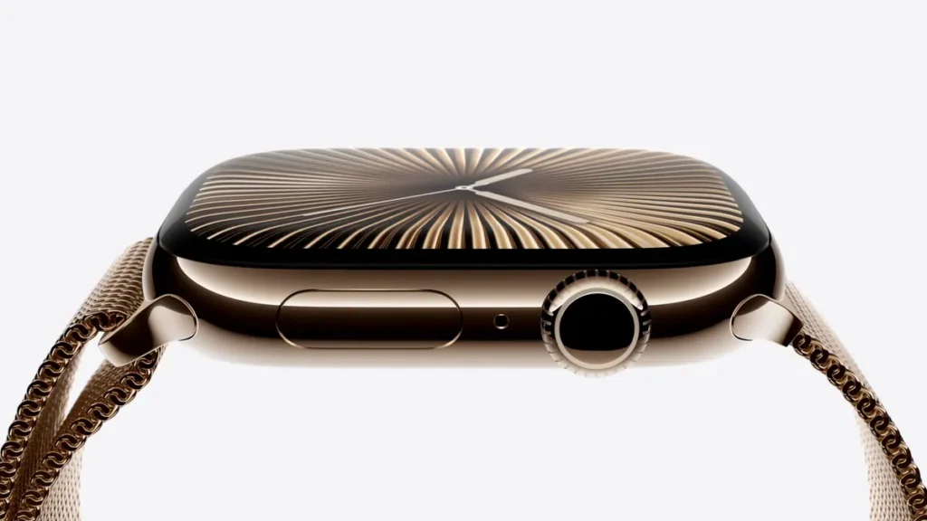 Vista lateral do Apple Watch em acabamento premium, destacando a Digital Crown, o botão lateral e o design da caixa, ilustrando a diferença entre Apple Watch Series 11 vs. Series 10 em termos de construção e materiais.